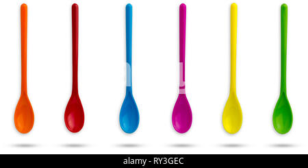 Set of multicolour plastic spoons on isolate white background with clipping path. Stock Photo