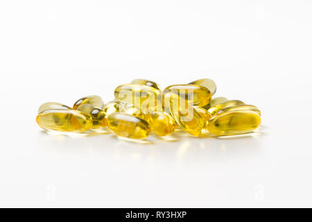 Pile of Omega 3 fish oil capsules Stock Photo