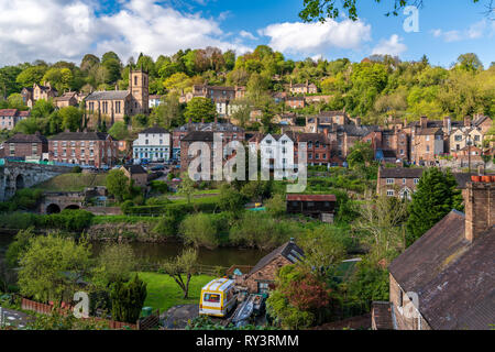 Ironbridge, Shropshire, England, UK - May 02, 2018: View at the town from the other side of the River Severn Stock Photo