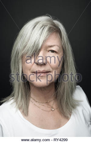 Portrait confident beautiful senior woman with gray hair