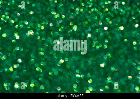 Green glitter texture christmas abstract background. Shiny wrapping paper texture, greeting card design element Stock Photo