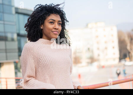 Happy millennial african american curly pregnant woman with belly in  headphones takes selfie on Stock Photo by Prostock-studio