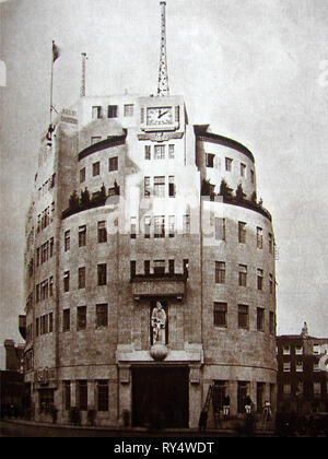 A vintage view of British broadcasting corporation headquarters (without any eastern extension)- 1934 View of Broadcasting House, Portland,Place, London (BBC) with Langham Place in background. It originally housed 22 radio studios. The statues of Prospero and Ariel can be seen above the front entrance Stock Photo