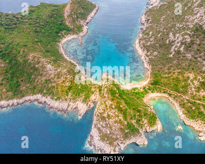 Recent aerial photo of double beach with tropical blue seas, white sandy beaches and plants. Porto Timoni, Corfu, Greece Stock Photo