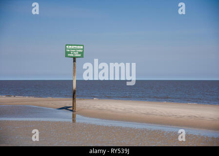 Sign Post Warning Of Strong Ocean Tidal Current on Jekyll Island GA Stock Photo