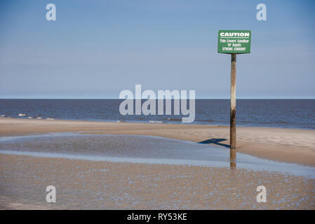 Sign Post Warning Of Strong Ocean Tidal Current on Jekyll Island GA Stock Photo
