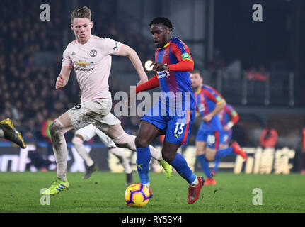 LONDON, ENGLAND - FEBRUARY 27, 2019: Scott McTominay of Manchester and Jeffrey Schlupp of Palace pictured during the 2018/19 Premier League game between Crystal Palace FC and Manchester United at Selhurst Park. Stock Photo
