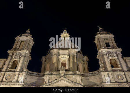 Piazza Navona Square, Borromini's Saint Agnese in Agone church. Front low angle view by night. Rome, Italy, Europe, European Union, EU. Copy space. Stock Photo