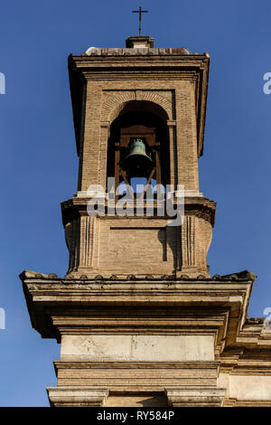 Sant'Anastasia Basilica al Palatino. Bell tower, belfry. Christian Church in Rome, Italy, Europe. Campitelli quarter. Blue sky, low angle view, pov.