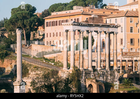 Rome, Italy. Column Of Phocas And The Temple Of Saturn. Colonna Di Foca And Tempio Di Saturno. The Historic Centre Of Rome Is A UNESCO World Heritage Stock Photo