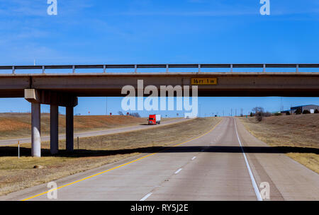 View of freeway from the car in county, with not very busy lanes. Stock Photo