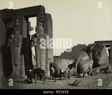 Egypt, Sinai and Jerusalem: A Series of Twenty Photographic Views, with Descriptions by Mrs. Poole and Reginald Stuart Poole: Fallen Statue at the Ramesseum, Thebes, 1857. Francis Frith (British, 1822-1898), William Mackenzie. Albumen print from wet collodion negative; image: 38.3 x 48.2 cm (15 1/16 x 19 in.); matted: 61 x 76.2 cm (24 x 30 in Stock Photo