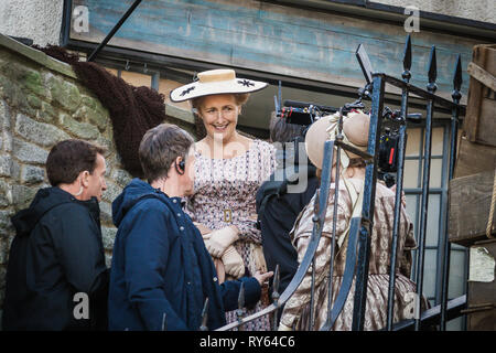Lyme Regis, Dorset, UK. 11th Mar, 2019. Filming of Ammonite a feature film about the life of Fossil Hunter Mary Anning. Filmed on location in Lyme Regis, a town in West Dorset, England, where the real Mary Anning worked and collected fossils in the early 1800s Credit: David Betteridge/Alamy Live News Stock Photo