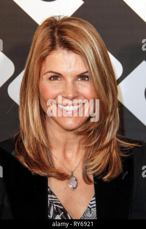 ***FILE PHOTO*** Felicity Huffman and Lori Loughlin Indicted in College Admission Bribery Case. LOS ANGELES, CA - JANUARY 10: Lori Loughlin at Diane Von Furstenberg's Journey of A Dress Exhibition Opening Celebration at May Company Building at LACMA West on January 10, 2014 in Los Angeles, California. Credit: mpi99/MediaPunch Stock Photo