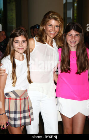 BEVERLY HILLS, CA - JULY 24:  Lori Loughlin Candace Cameron Bure attends Hallmark Channel and Hallmark Movie Channel's '2013 Summer TCA' Press Gala at The Beverly Hilton Hotel on July 24, 2013 in Beverly Hills, California  People:  Lori Loughlin Stock Photo