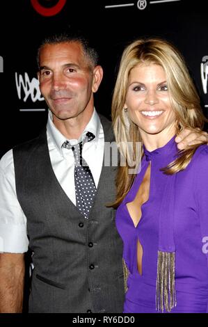 File Photo. 12th Mar, 2019. Lori Loughlin, The 'Full House' actress and fashion designer Mossimo Giannulli are among nearly 50 people charged in an admissions bribery scheme. PICTURED: Oct. 19, 2006 - Hollywood, California, U.S. - LORI LOUGHLIN AND Mossimo Giannulli at The Target Fashion Week Bash held at Area. Credit: Michael Germana/Globe Photos/ZUMAPRESS.com/Alamy Live News Stock Photo