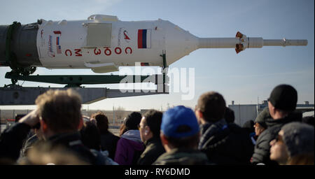 Baikonur, Kazakhstan. 12th Mar, 2019. The Russian Soyuz MS-12 rocket is transported by train to the launch pad at the Baikonur Cosmodrome March 12, 2019 in Baikonur, Kazakhstan. The Expedition 59 crew: Nick Hague and Christina Koch of NASA and Alexey Ovchinin of Roscosmos will launch March 14th for a six-and-a-half month mission on the International Space Station. Credit: Planetpix/Alamy Live News Stock Photo