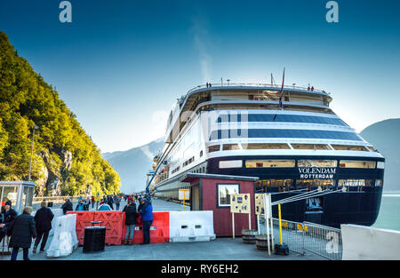 September 15, 2018 - Skagway, AK: Passengers passing through security point and returning to cruise ships on foot on White Pass dock, late afternoon. Stock Photo