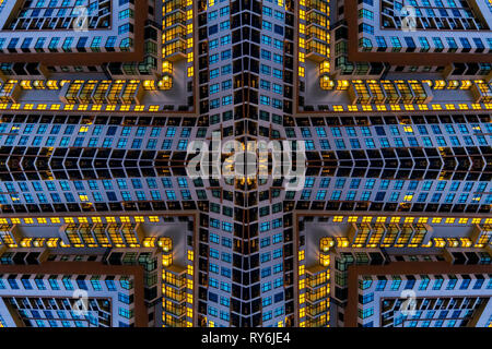 Symmetry view of illuminated modern building Stock Photo