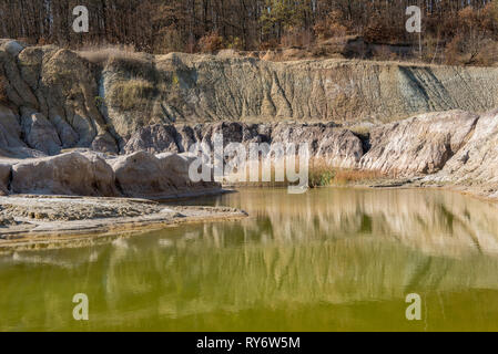Contaminated mine water pollution in abandoned open pit Stock Photo