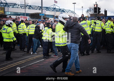Bordesley, Birmingham, West Midlands, UK. 10th March 2019. Up to 150 home supporters taunted and threw bottles at arriving Aston Villa fans prior to t Stock Photo