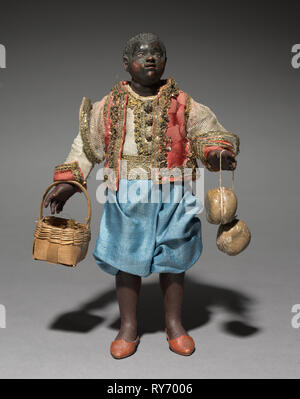 Figure from a Crèche: Attendant of the Magi, 1780-1830. Italy, Naples, late 18th-early 19th century. Painted wood and terracotta with various textiles; overall: 36.1 cm (14 3/16 in Stock Photo