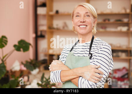 Female Artisan in Workshop Stock Photo