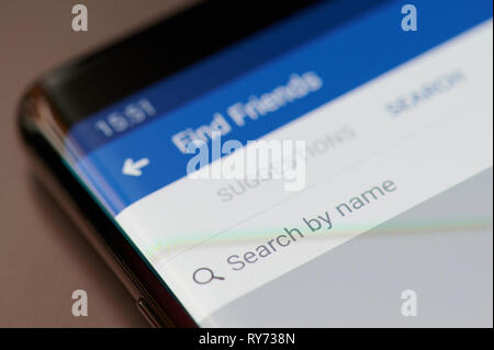 New york, USA - march 11, 2019: Search by name friends in facebook on smartphone screen Stock Photo