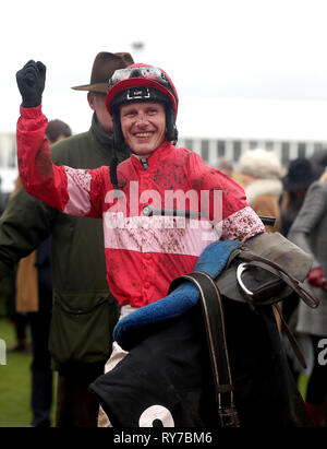 Jockey Paul Townend celebrates after winning the Racing Post Arkle Challenge Trophy Novices' Chase on Duc Des Genievres during Champion Day of the 2019 Cheltenham Festival at Cheltenham Racecourse. Stock Photo