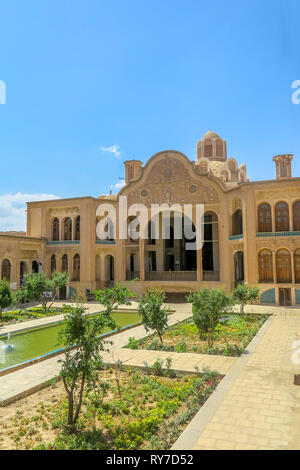 Kashan Boroujerd Historical House Courtyard Frontal View Point with Fountain Pond Stock Photo