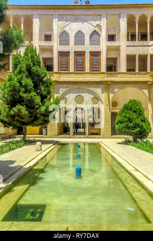 Kashan Boroujerd Historical House Courtyard Facade Back View with Fountain Pond Stock Photo