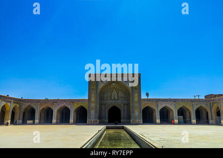 Shiraz Vakil Mosque Madrasa Blue Tiles Ornament Iwan and Pool Stock Photo