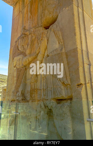 Persepolis Historical Site Wall Carving of a Lion and an Ancient Persian Soldiers Stock Photo