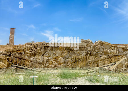 Persepolis Historical Site Wall Carving of a Lion and Bull Combat Mythological Symbol Stock Photo