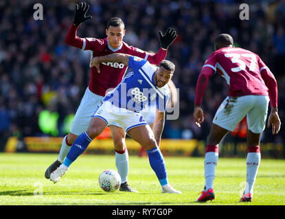 Birmingham City's David Davis holds off challenge from Aston Villa's Anwar El Ghazi during the Sky Bet Championship match at St Andrew's Trillion Trophy Stadium, Birmingham. Stock Photo