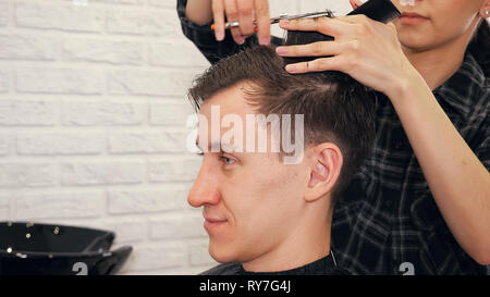 Female Hairdresser Haircut Doing Male Hair Style Stock Photo