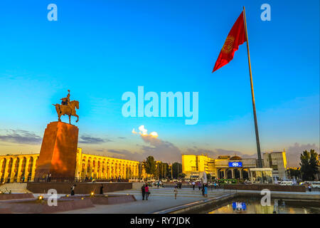 Bishkek Ala Too Square Waving Kyrgyz Flag on Flagpole with Hero Manas Statue View Point Stock Photo