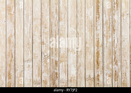 Light wooden background composed of vertical wooden planks ruined by time Stock Photo