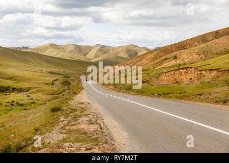 asphalt road Darkhan-Ulaanbaatar in Mongolia, Asian Highway Stock Photo
