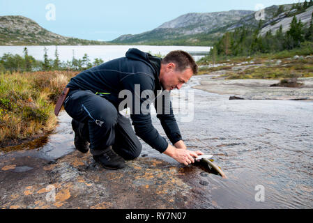 Fishing and hiking in Norway Stock Photo