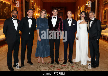 (left to right) Chiwetel Ejiofor, Luke Evans, Tamsin Egerton, Josh Hartnett, Benedict Cumberbatch, Amal Clooney and George Clooney at a dinner for donors, supporters and ambassadors of Prince's Trust International at Buckingham Palace in London. Stock Photo