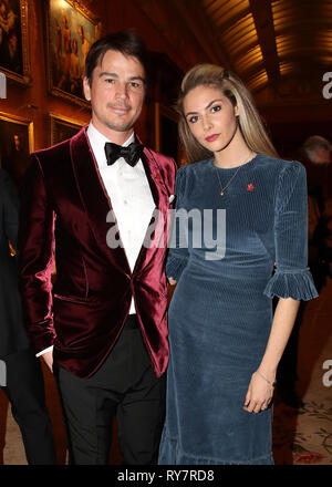 Josh Hartnett and Tamsin Egerton attend a dinner for donors, supporters and ambassadors of Prince's Trust International at Buckingham Palace in London. Stock Photo