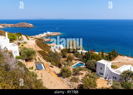 View of south east coastline of Sifnos with Chrisopigi Monastery in background. Cyclades, Aegean Sea, Greece, Europe Stock Photo