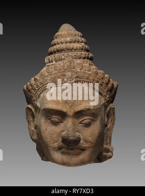 Colossal Head of a Deva, c. 1200. Cambodia, Angkor, c. early 13th century. Sandstone; overall: 71.3 x 50 x 47 cm (28 1/16 x 19 11/16 x 18 1/2 in Stock Photo