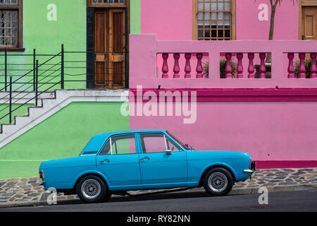 Old Blue Ford Cortina Car in front of Multi Coloured Houses of Bo Kaap, Cape Town, Western Cape, South Africa