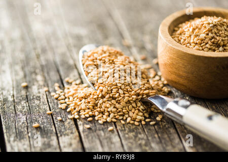 Roasted sesame seeds in spoon. Stock Photo