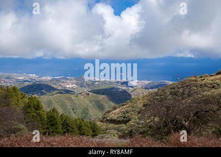 Gran Canaria,  February, view from a hiking path in the mountains towards coast, oil platforms in the ocean Stock Photo