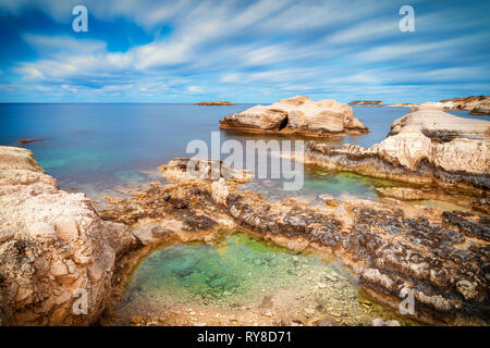 Sea caves on Coral bay coastline, Cyprus, Peyia, Paphos district Stock Photo