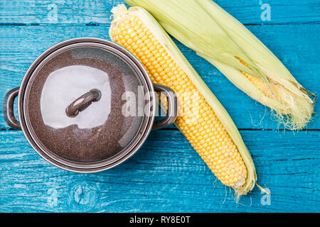 Photo on top of iron pan with corn Stock Photo