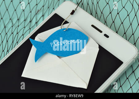 Password written on a paper note in the shape of a fish attached to a hook on an envelope and a mobile phone - Phishing and mobile phone security conc Stock Photo